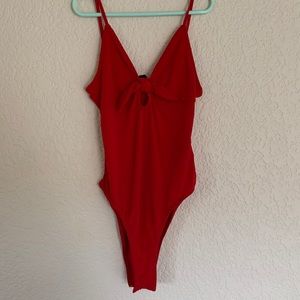 Red bow tie body suit